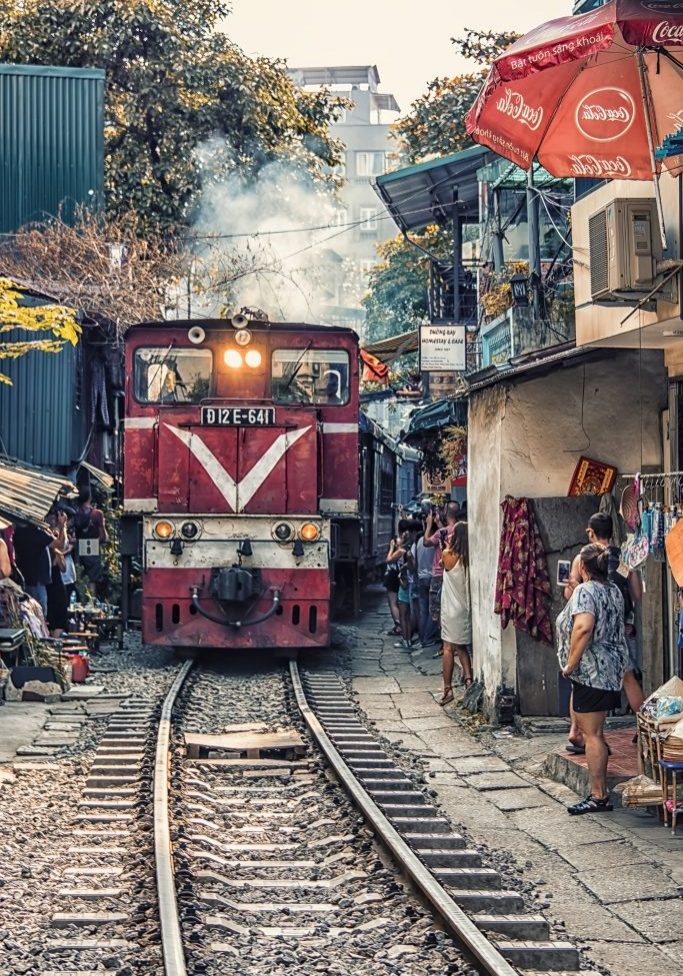December 2018 - Hanoi, Vietnam - Train street in Hanoi. Train using the small street very near the traditional housing
